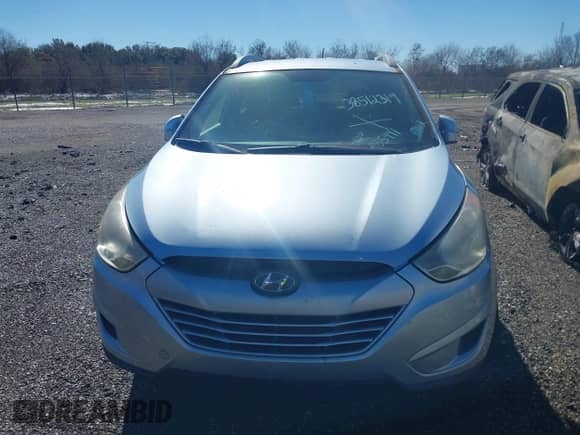 2012 Hyundai Tucson GLS with VIN KM8JU3AC3CU469367, listed as a IAAI auction lot 38512319 with 185,441 mi miles and . Bid and sale history available at DreamBid. Image 6.