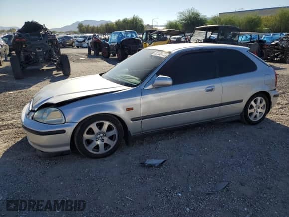 1996 Honda Civic with VIN EK31012869, listed as a Copart auction lot 82168175 with 96,715 mi miles and Salvage title. Bid and sale history available at DreamBid. Image 1.