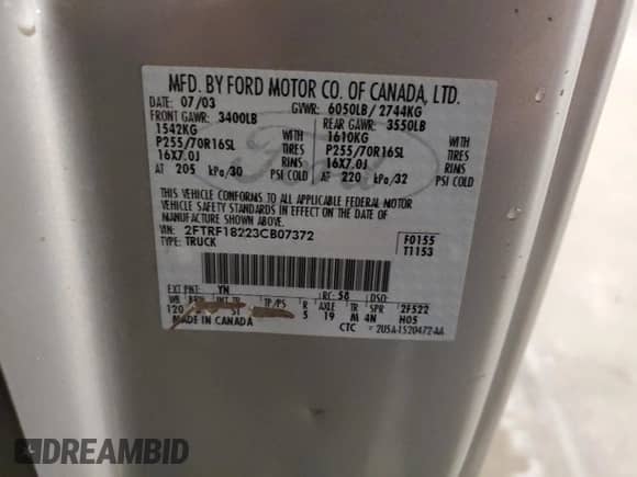 2003 Ford F-150 XL z VIN 2FTRF18223CB07372, wystawiony jako Copart lot #55390725 z przebiegiem 171 638 mil mil oraz Szkoda całkowita • Salvage title. Historia ofert i sprzedaży dostępna na DreamBid. Obrazek 12.