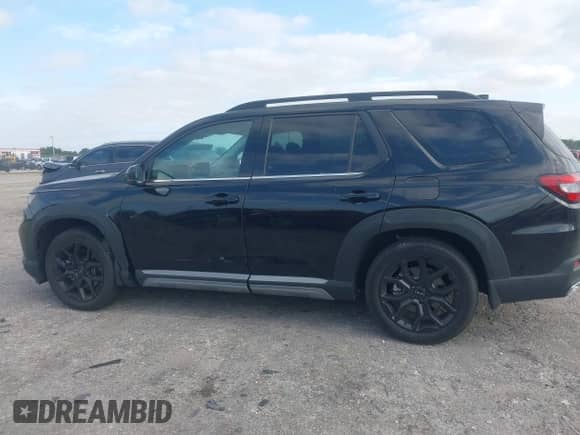 2025 Honda Pilot Touring с VIN 5FNYG2H73SB011882, выставлен на аукционе IAAI как лот 42092996 с пробегом 8 616 миль миль и . История ставок и продаж доступна на DreamBid. Изображение 13.