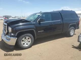 2019 GMC Sierra 1500 SLE with VIN 2GTV2MECXK1127002, listed as a Copart auction lot 61127735 with 63,923 mi miles and Salvage title. Bid and sale history available at DreamBid. Image 1.