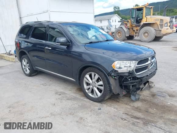 2013 Dodge Durango Crew with VIN 1C4RDJDG6DC690060, listed as a IAAI auction lot 43134968 with 160,833 mi miles and . Bid and sale history available at DreamBid. Image 1.