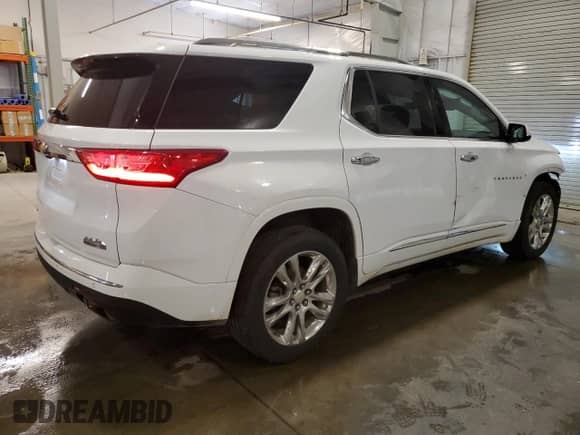 2018 Chevrolet Traverse High Country z VIN 1GNEVKKW3JJ211717, wystawiony jako Copart lot #69195595 z przebiegiem 147 642 mil mil oraz Szkoda całkowita • Salvage title. Historia ofert i sprzedaży dostępna na DreamBid. Obrazek 3.