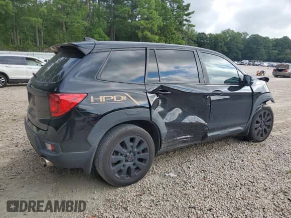 2022 Honda Passport EX-L with VIN 5FNYF7H58NB001285, listed as a Copart auction lot 70292965 with 151,598 mi miles and Salvage title. Bid and sale history available at DreamBid. Image 3.