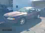 1996 Ford Mustang GT z VIN 1FALP42X2TF130573, wystawiony jako IAAI lot #43490908 z przebiegiem 281 802 mil mil oraz . Historia ofert i sprzedaży dostępna na DreamBid. Obrazek 2.