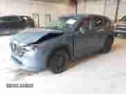 2022 Mazda CX-5 S Preferred z VIN JM3KFBCM6N0635417, wystawiony jako IAAI lot #43062973 z przebiegiem 63 803 mil mil oraz . Historia ofert i sprzedaży dostępna na DreamBid. Obrazek 2.