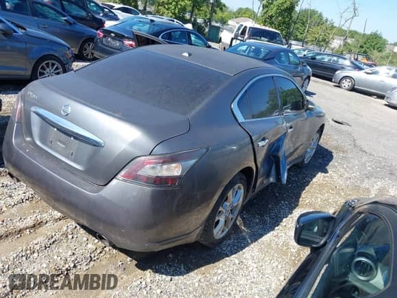 2014 Nissan Maxima S with VIN 1N4AA5AP6EC461404, listed as a IAAI auction lot 43054214 with 116,067 mi miles and . Bid and sale history available at DreamBid. Image 4.