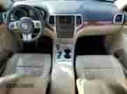 2013 Jeep Grand Cherokee Limited z VIN 1C4RJFBG7DC648943, wystawiony jako Copart lot #85731515 z przebiegiem 200 146 mil mil oraz Szkoda całkowita • Salvage title. Historia ofert i sprzedaży dostępna na DreamBid. Obrazek 8.