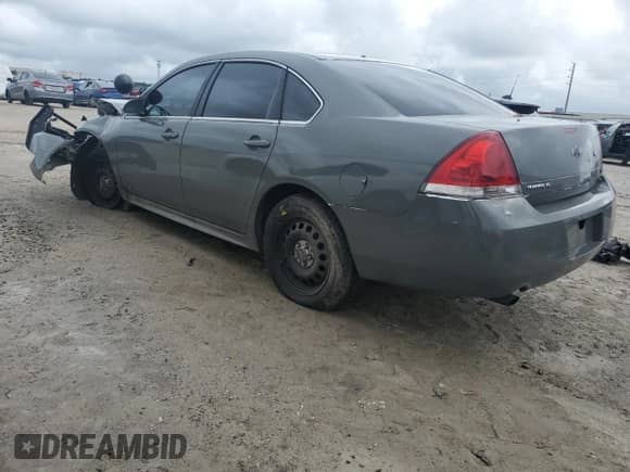 2012 Chevrolet Impala Police Police with VIN 2G1WD5E3XC1162170, listed as a Copart auction lot 70986324 with 148,208 mi miles and Salvage title. Bid and sale history available at DreamBid. Image 2.