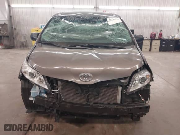 2015 Toyota Sienna L with VIN 5TDZK3DC9FS599350, listed as a IAAI auction lot 42246728 with 99,905 mi miles and . Bid and sale history available at DreamBid. Image 13.