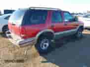 1999 Chevrolet Blazer LT with VIN 1GNCS13WXX2197052, listed as a IAAI auction lot 40851811 with 140,060 mi miles and . Bid and sale history available at DreamBid. Image 4.