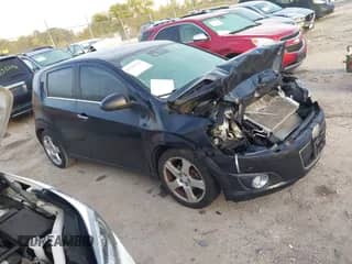 2015 Chevrolet Sonic LTZ with VIN 1G1JE6SB7F4215053, listed as a IAAI auction lot 43345113 with 166,054 mi miles and . Bid and sale history available at DreamBid. Image 1.