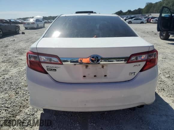 2012 Toyota Camry XLE z VIN 4T1BD1FK8CU022512, wystawiony jako Copart lot #82413865 z przebiegiem Nie podano mil oraz Szkoda całkowita • Salvage title. Historia ofert i sprzedaży dostępna na DreamBid. Obrazek 6.
