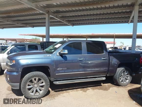 2018 Chevrolet Silverado 1500 LTZ z VIN 3GCUKSEC1JG495350, wystawiony jako IAAI lot #43318196 z przebiegiem 139 694 mil mil oraz . Historia ofert i sprzedaży dostępna na DreamBid. Obrazek 14.