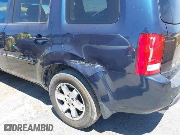 2011 Honda Pilot Touring с VIN 5FNYF3H98BB056455, выставлен на аукционе IAAI как лот 42897379 с пробегом 173 871 миль миль и . История ставок и продаж доступна на DreamBid. Изображение 6.