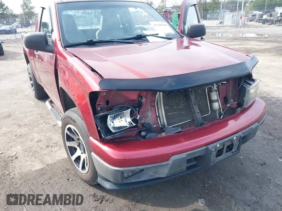 2011 Chevrolet Colorado Work Truck z VIN 1GCCSBF94B8134281, wystawiony jako IAAI lot #41546706 z przebiegiem 248 887 mil mil oraz . Historia ofert i sprzedaży dostępna na DreamBid. Obrazek 6.