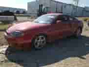 2005 Hyundai Tiburon GT с VIN KMHHN65F85U182644, выставлен на аукционе Copart как лот 63826104 с пробегом 100 245 миль миль и Списание • Salvage title. История ставок и продаж доступна на DreamBid. Изображение 1.