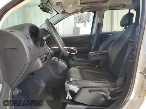 2014 Jeep Compass Latitude with VIN 1C4NJCEB9ED826084, listed as a Copart auction lot 72266434 with 103,718 mi miles and Salvage title. Bid and sale history available at DreamBid. Image 7.