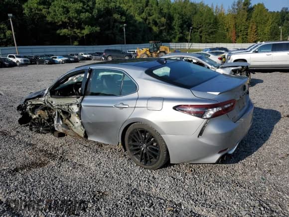 2021 Toyota Camry XSE with VIN 4T1K61AK3MU421363, listed as a Copart auction lot 80719775 with 129,804 mi miles and Salvage title. Bid and sale history available at DreamBid. Image 2.