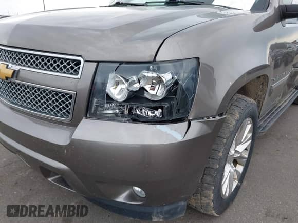 2014 Chevrolet Suburban LTZ with VIN 1GNSKKE77ER152503, listed as a IAAI auction lot 42105720 with 152,767 mi miles and . Bid and sale history available at DreamBid. Image 6.