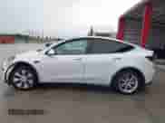 2022 Tesla Model Y Long Range z VIN 7SAYGDEE4NF510003, wystawiony jako IAAI lot #43185983 z przebiegiem 25 165 mil mil oraz . Historia ofert i sprzedaży dostępna na DreamBid. Obrazek 14.