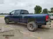2003 Dodge 3500 ST with VIN 3D7MU48C83G775356, listed as a Copart auction lot 60374164 with 243,405 mi miles and Salvage title. Bid and sale history available at DreamBid. Image 2.