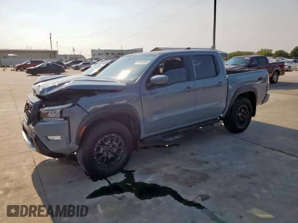 2023 Nissan Frontier SV with VIN 1N6ED1EKXPN664875, listed as a Copart auction lot 67924835 with 37,160 mi miles and Salvage title. Bid and sale history available at DreamBid. Image 1.