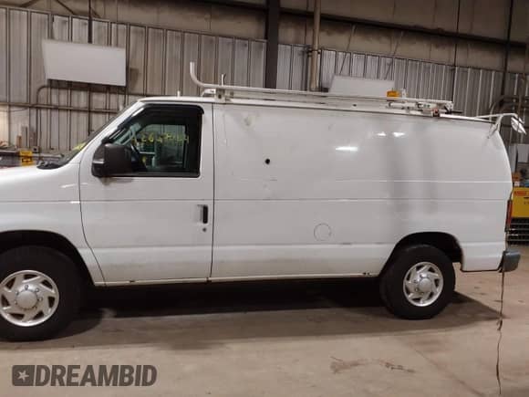 2014 Ford Econoline Cargo Commercial with VIN 1FTNE2EL6EDB13764, listed as a IAAI auction lot 42647684 with 99,876 mi miles and . Bid and sale history available at DreamBid. Image 14.