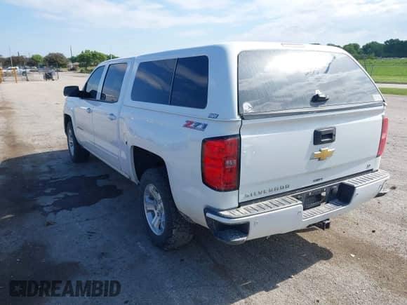 2016 Chevrolet Silverado 1500 LT with VIN 3GCUKRECXGG291194, listed as a IAAI auction lot 42397738 with 185,764 mi miles and . Bid and sale history available at DreamBid. Image 3.