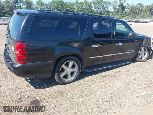 2011 Chevrolet Suburban LTZ с VIN 1GNSKKE3XBR173919, выставлен на аукционе IAAI как лот 42746108 с пробегом 260 644 миль миль и . История ставок и продаж доступна на DreamBid. Изображение 4.