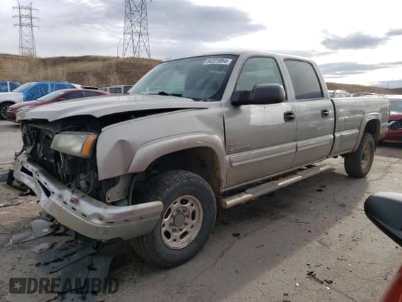 2003 Chevrolet Silverado 2500HD LT with VIN 1GCHK23103F137728, listed as a Copart auction lot 86221954 with 201,886 mi miles and Salvage title. Bid and sale history available at DreamBid. Image 1.