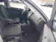 2014 Volkswagen Tiguan S with VIN WVGBV3AXXEW596502, listed as a IAAI auction lot 43538779 with 111,908 mi miles and . Bid and sale history available at DreamBid. Image 5.