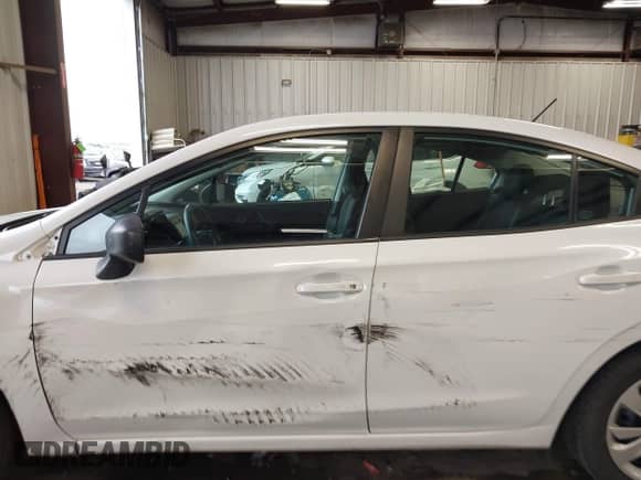 2018 Subaru Impreza with VIN 4S3GKAA63J1623688, listed as a IAAI auction lot 42289401 with 57,873 mi miles and . Bid and sale history available at DreamBid. Image 15.