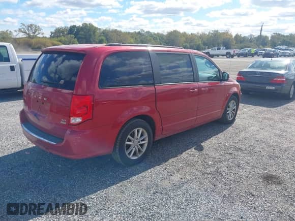 2014 Dodge Grand Caravan SXT with VIN 2C4RDGCG7ER391075, listed as a IAAI auction lot 43363742 with 270,018 mi miles and . Bid and sale history available at DreamBid. Image 4.
