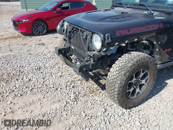 2021 Jeep Wrangler Unlimited Rubicon with VIN 1C4HJXFN5MW550311, listed as a IAAI auction lot 43233853 with 73,508 mi miles and . Bid and sale history available at DreamBid. Image 6.