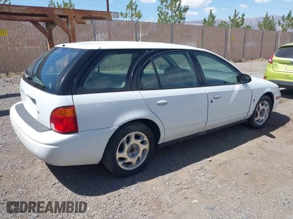 2000 Saturn SW with VIN 1G8ZN8271YZ187106, listed as a IAAI auction lot 42835585 with 174,768 mi miles and . Bid and sale history available at DreamBid. Image 4.