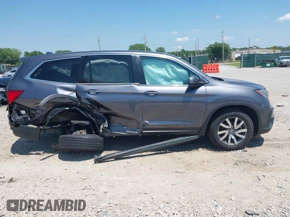 2020 Honda Pilot EX-L with VIN 5FNYF6H53LB011181, listed as a IAAI auction lot 42385292 with 63,641 mi miles and . Bid and sale history available at DreamBid. Image 12.