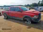 2016 Ram 1500 Rebel z VIN 1C6RR7YT7GS296256, wystawiony jako Copart lot #69448335 z przebiegiem 119 448 mil mil oraz Szkoda całkowita • Salvage title. Historia ofert i sprzedaży dostępna na DreamBid. Obrazek 4.