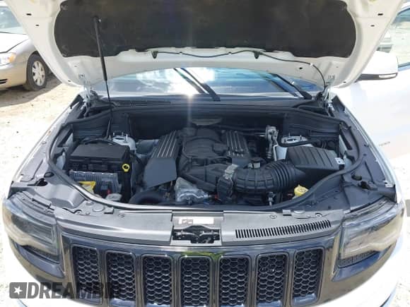 2014 Jeep Grand Cherokee SRT-8 z VIN 1C4RJFDJXEC450402, wystawiony jako IAAI lot #42705334 z przebiegiem 67 372 mil mil oraz . Historia ofert i sprzedaży dostępna na DreamBid. Obrazek 10.