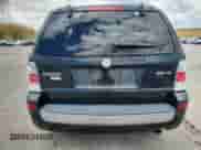 2008 Mercury Mariner Premier with VIN 4M2CU97108KJ12909, listed as a Copart auction lot 70864465 with 128,018 mi miles and Salvage title. Bid and sale history available at DreamBid. Image 6.