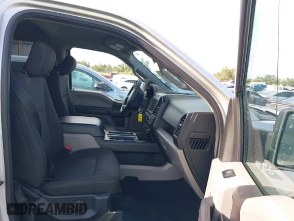 2018 Ford F-150 XL with VIN 1FTEW1CP8JKC70201, listed as a IAAI auction lot 42620912 with 124,499 mi miles and . Bid and sale history available at DreamBid. Image 5.