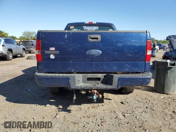 2007 Ford F-150 STX with VIN 1FTRX12W97FB64302, listed as a Copart auction lot 71510635 with Not provided miles and Salvage title. Bid and sale history available at DreamBid. Image 6.