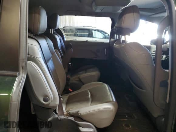 2021 Toyota Sienna Limited z VIN 5TDZSKFC1MS004883, wystawiony jako Copart lot #70192795 z przebiegiem Nie podano mil oraz Szkoda całkowita • Salvage title. Historia ofert i sprzedaży dostępna na DreamBid. Obrazek 11.