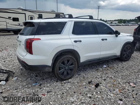2023 Hyundai Palisade XRT z VIN KM8R3DGE9PU629892, wystawiony jako Copart lot #64610905 z przebiegiem 52 268 mil mil oraz Szkoda całkowita • Salvage title. Historia ofert i sprzedaży dostępna na DreamBid. Obrazek 3.