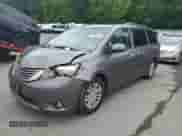 2011 Toyota Sienna XLE AAS with VIN 5TDYK3DCXBS107589, listed as a Copart auction lot 59540615 with 211,868 mi miles and Salvage title. Bid and sale history available at DreamBid. Image 1.
