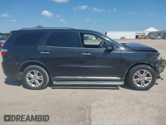 2013 Dodge Durango Crew with VIN 1C4RDHDG4DC650990, listed as a IAAI auction lot 43011286 with 159,642 mi miles and . Bid and sale history available at DreamBid. Image 14.