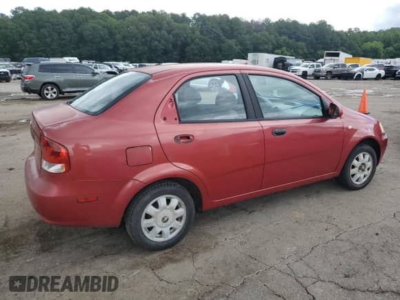 2005 Chevrolet Aveo LT с VIN KL1TG52645B399960, выставлен на аукционе Copart как лот 67527514 с пробегом 183 940 миль миль и Списание • Salvage title. История ставок и продаж доступна на DreamBid. Изображение 3.