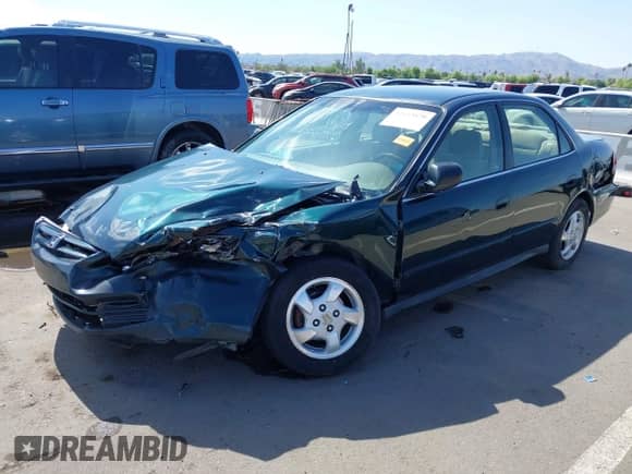 2001 Honda Accord LX with VIN JHMCG665X1C004411, listed as a IAAI auction lot 42653879 with 200,554 mi miles and . Bid and sale history available at DreamBid. Image 6.