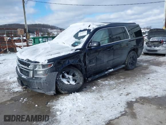 2019 Chevrolet Tahoe LS with VIN 1GNSKAKC9KR336283, listed as a IAAI auction lot 41280975 with 85,682 mi miles and . Bid and sale history available at DreamBid. Image 2.