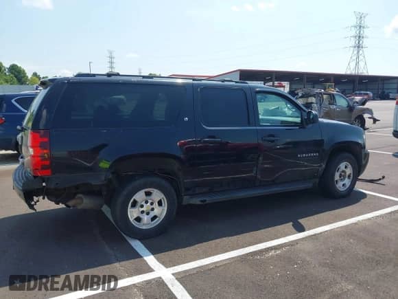 2011 Chevrolet Suburban LT with VIN 1GNSKJE34BR151246, listed as a IAAI auction lot 42520210 with 239,240 mi miles and . Bid and sale history available at DreamBid. Image 13.